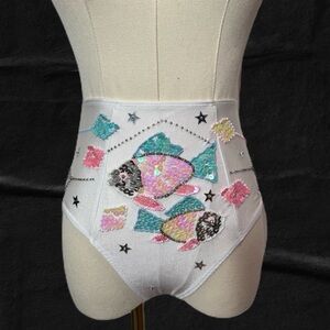 Her pony sequin fish hot pants